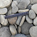 Kamenclub.ru: Галька речная плоская (серо-белая) фр. 70-120 мм. купить  в Королеве галька галечник речной серый, белый окатанная плоская  природная галька 9000 руб/т   фото КАМЕНЬ КЛУБ