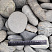 Kamenclub.ru: Галька речная окат (темно-серая) фр. 70-150 мм. купить  в Королеве галька речная темно-серая, синяя, серая речная галька округлая  8000 руб/т   фото КАМЕНЬ КЛУБ